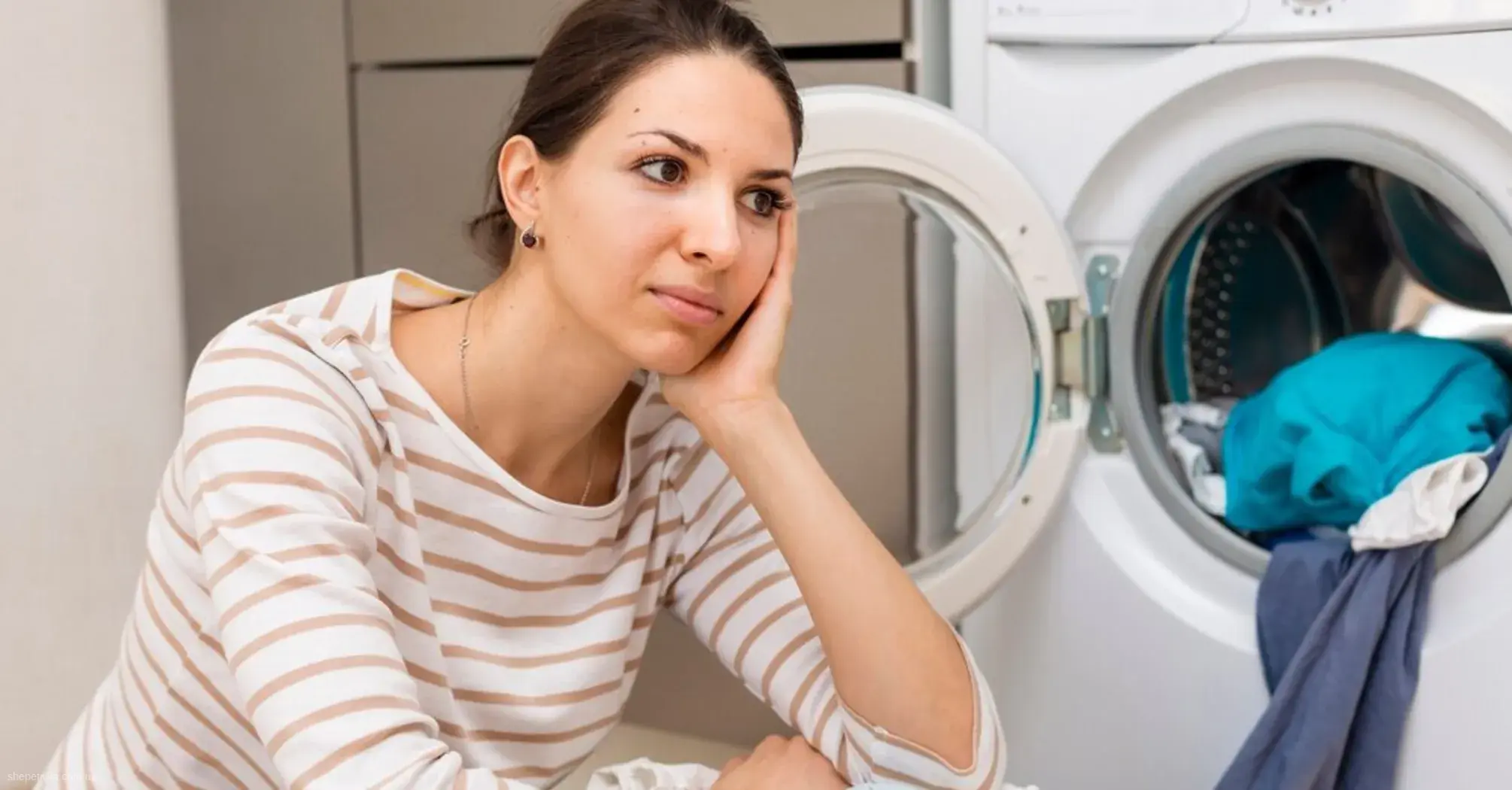 life tired woman doing laundry23 2148386953